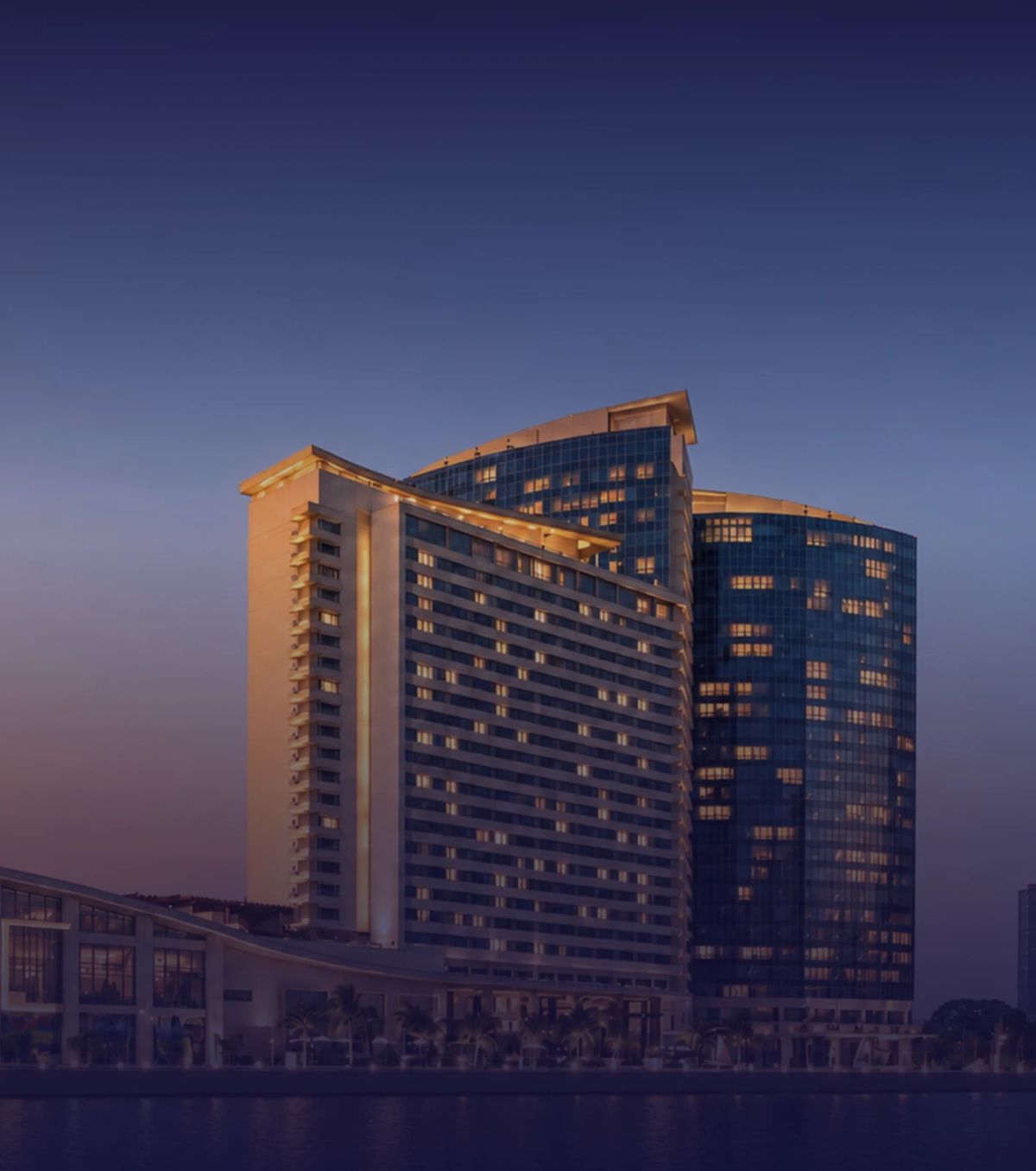 Hyatt Regency Trinidad on the Port of Spain waterfront at dusk
